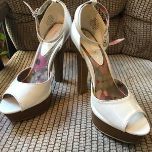 Madden Girl white patent leather wood grain heel.